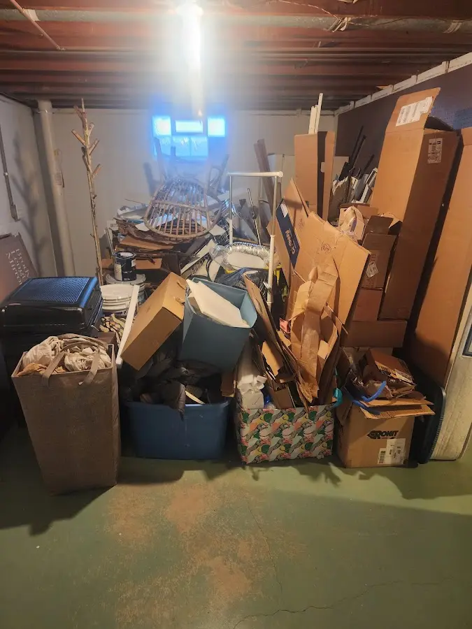 Roll-off dumpster container at job site for 2 Yard Dumpster Rental in Wildewood